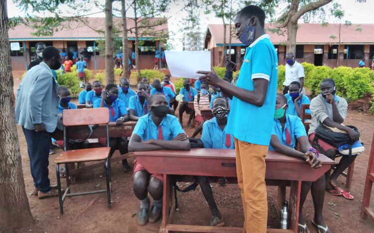 Youth and teachers learning about Conflict Resolution Education from WPDI in Northern Uganda