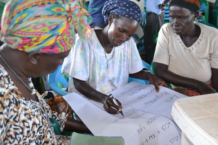 Group of women prepare a business plan