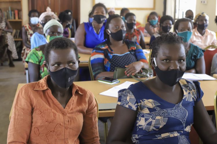 Youth in Uganda learning about Business and Entrepreneurship to start their own businesses through WPDI's Business Boot Camp 