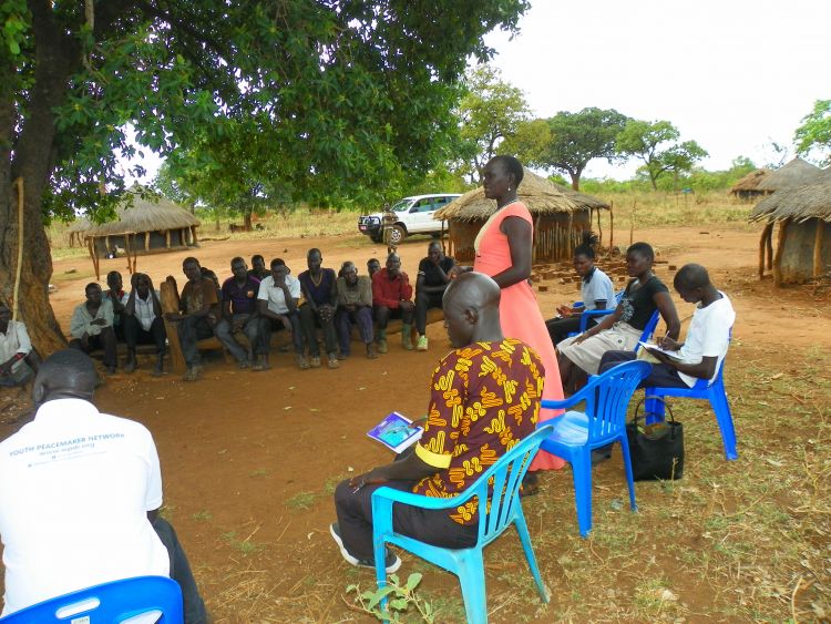 Speaking out at a Community Dialogue