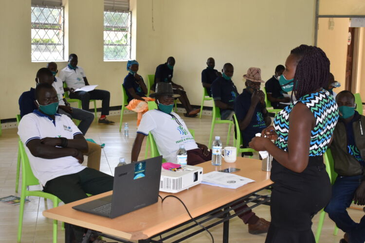 Community leaders learning about Conflict Resolution from WPDI in Karamoja, Uganda