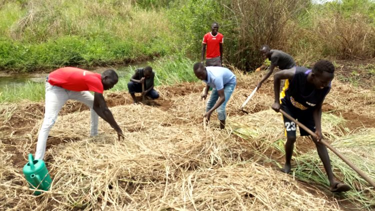 WPDI youth helping a business in South Sudan